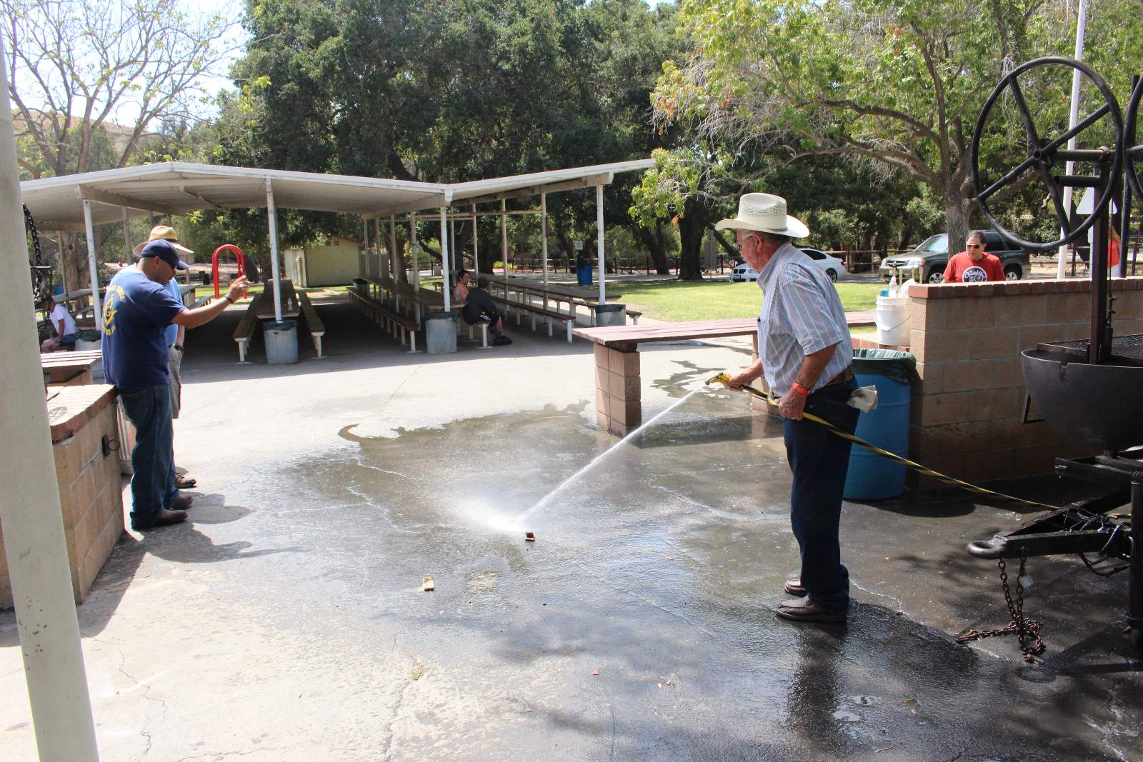 Dee helps with the cleanup